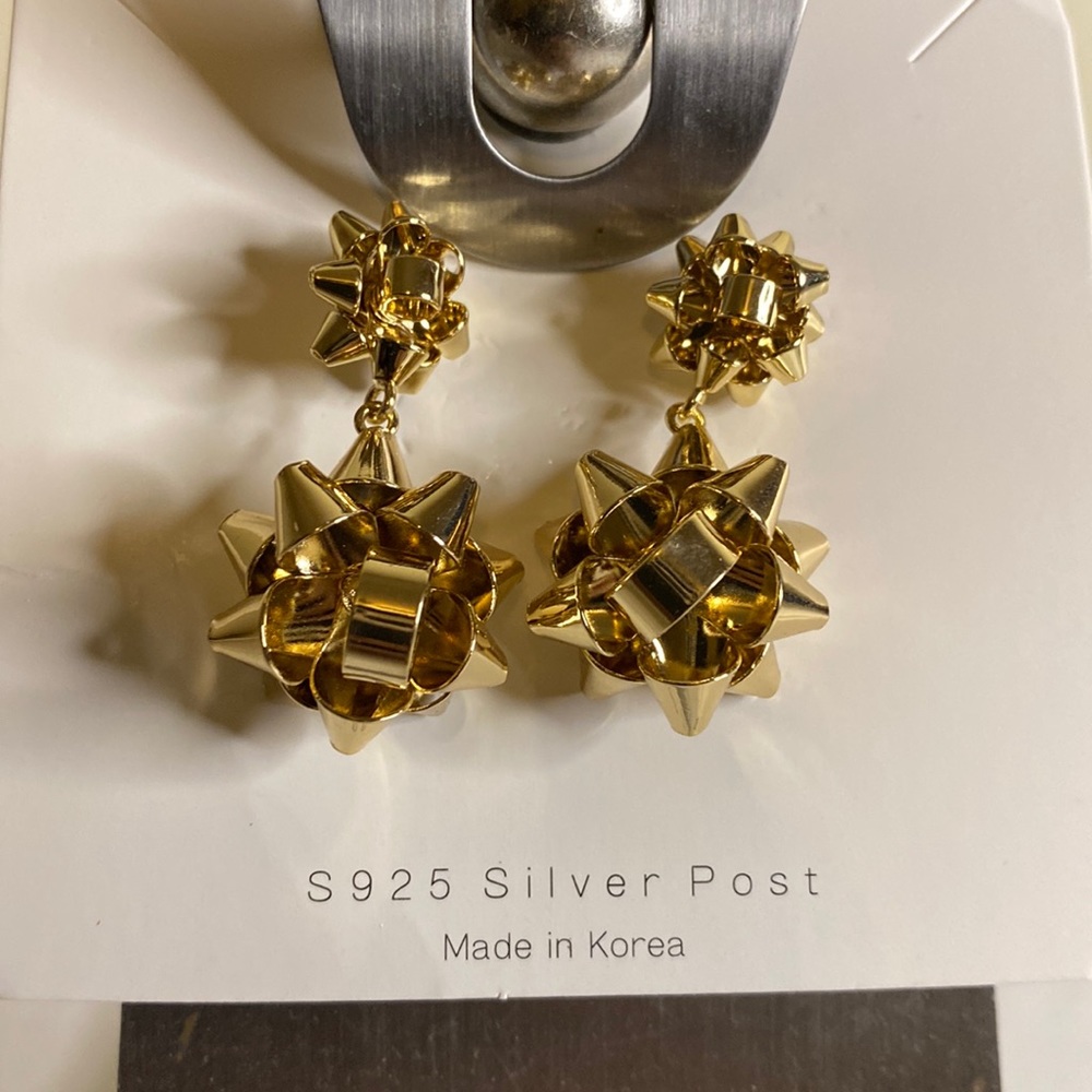 Golden bow stud earrings